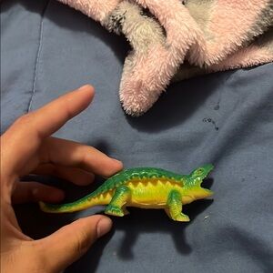 Green and Yellow Dinosaur Toy